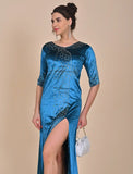 Blue velvet gown with slit